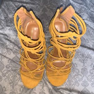 Yellow high heels